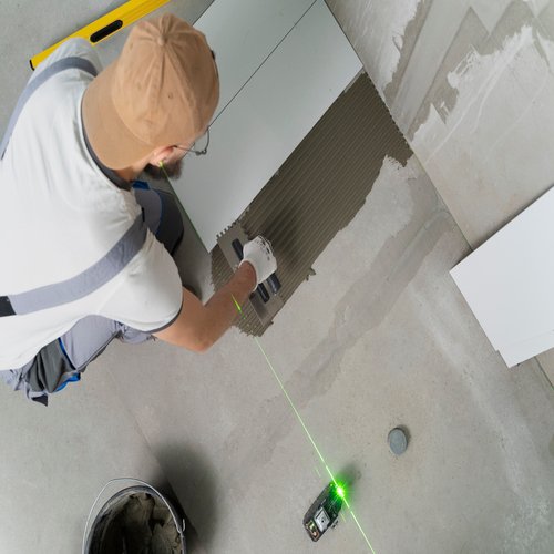 tiler-working-renovation-apartment
